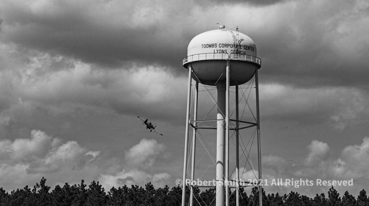 Water Tower and Plane in Monochrome