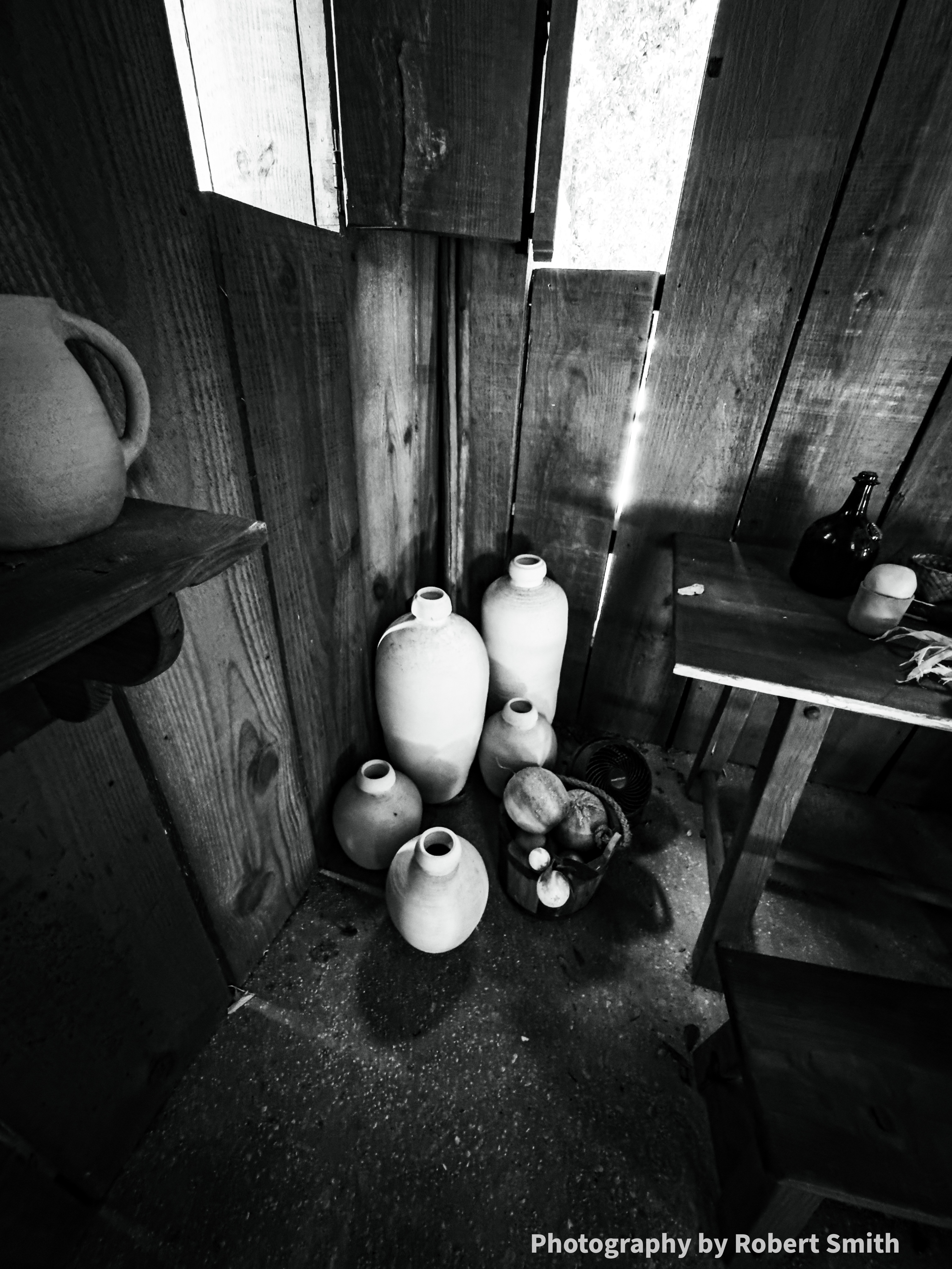 Jars in corner monochrome